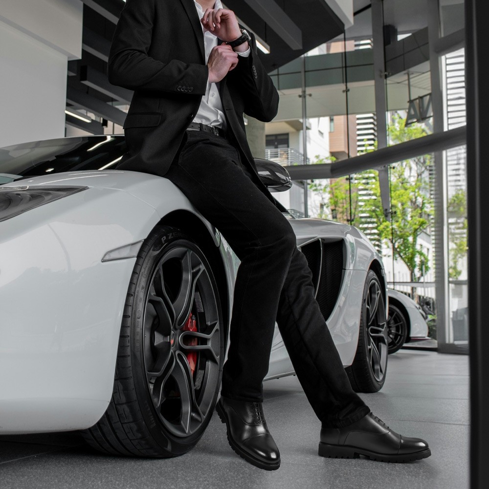 a men in fashionable elevator dress shoes