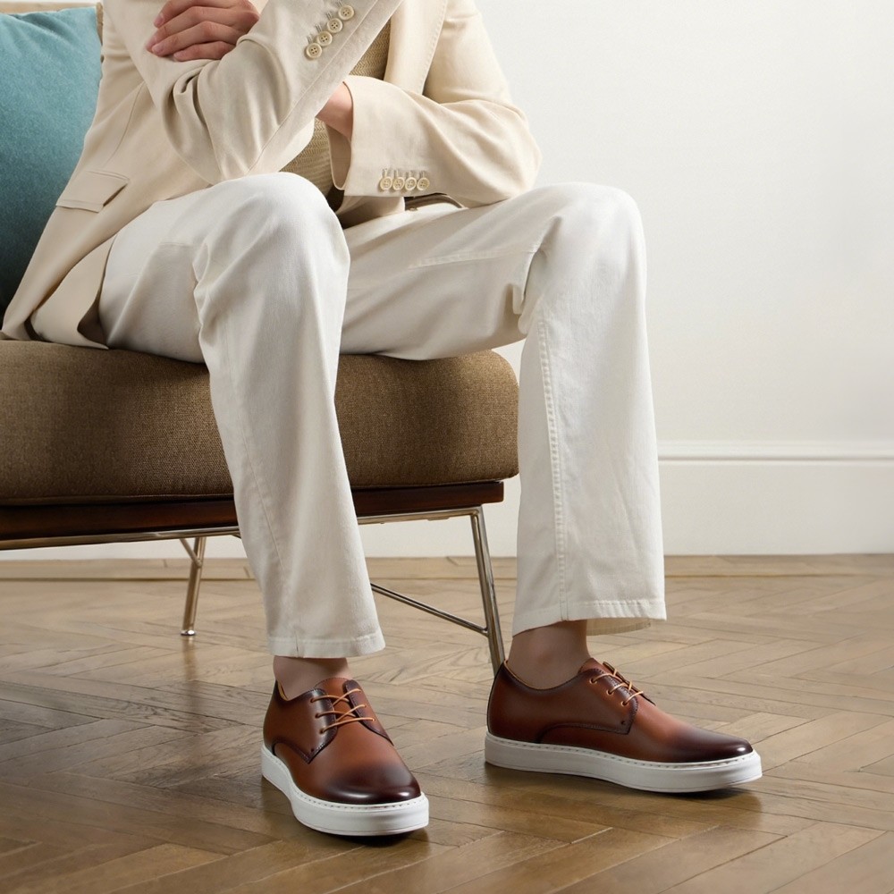 Sneakers in pelle con rialzo