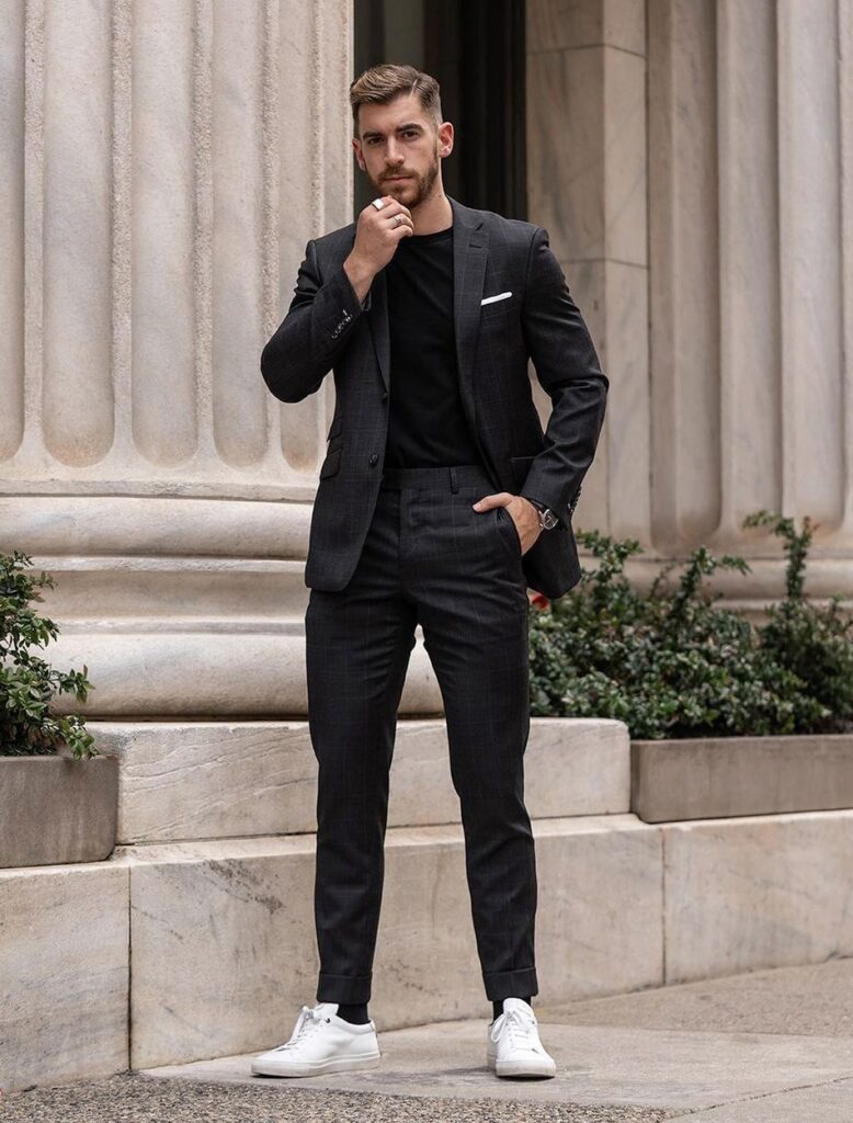 Outfit 1 Black suit with relaxed details