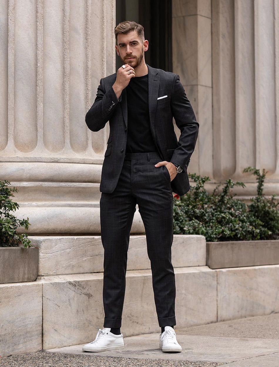 Outfit 1 Black suit with relaxed details