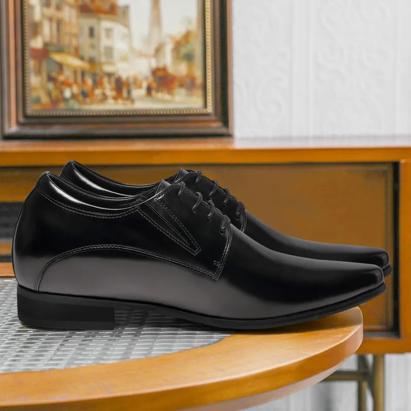 Professional black leather Derby elevator shoes for work with 8 cm height boost, executive office setting.