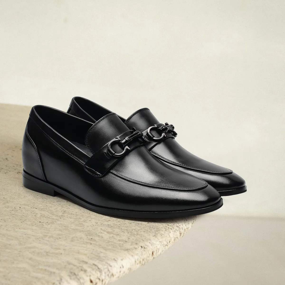 Men's premium leather loafers with horsebit detail and 6 cm internal height boost, casual luxury style.